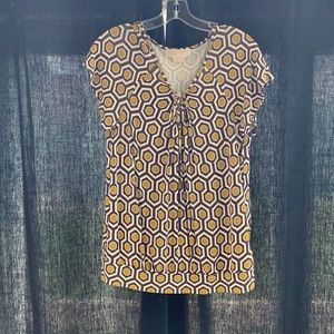 Geometric green, purple and cream top